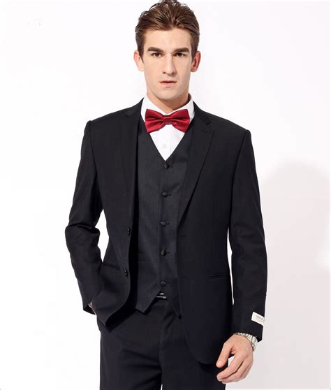 black suit red bow tie.